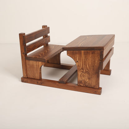 Wooden school desk baby prop, perfect for vintage classroom-themed photoshoots, featuring a rustic design and natural wood finish.