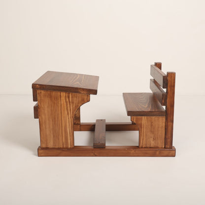 Wooden school desk baby prop, perfect for vintage classroom-themed photoshoots, featuring a rustic design and natural wood finish.