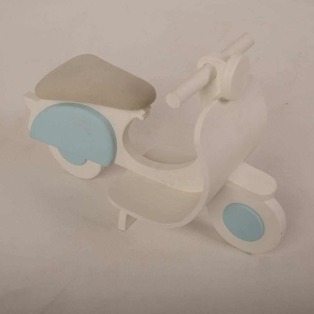 Adorable scooter baby photoshoot prop in vibrant colors, perfect for newborn and toddler photography setups.
