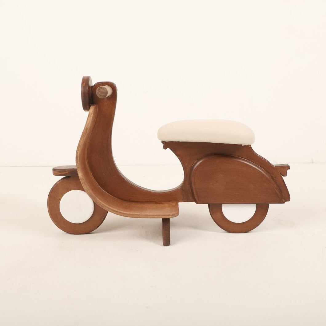 Adorable scooter baby photoshoot prop in vibrant colors, perfect for newborn and toddler photography setups.