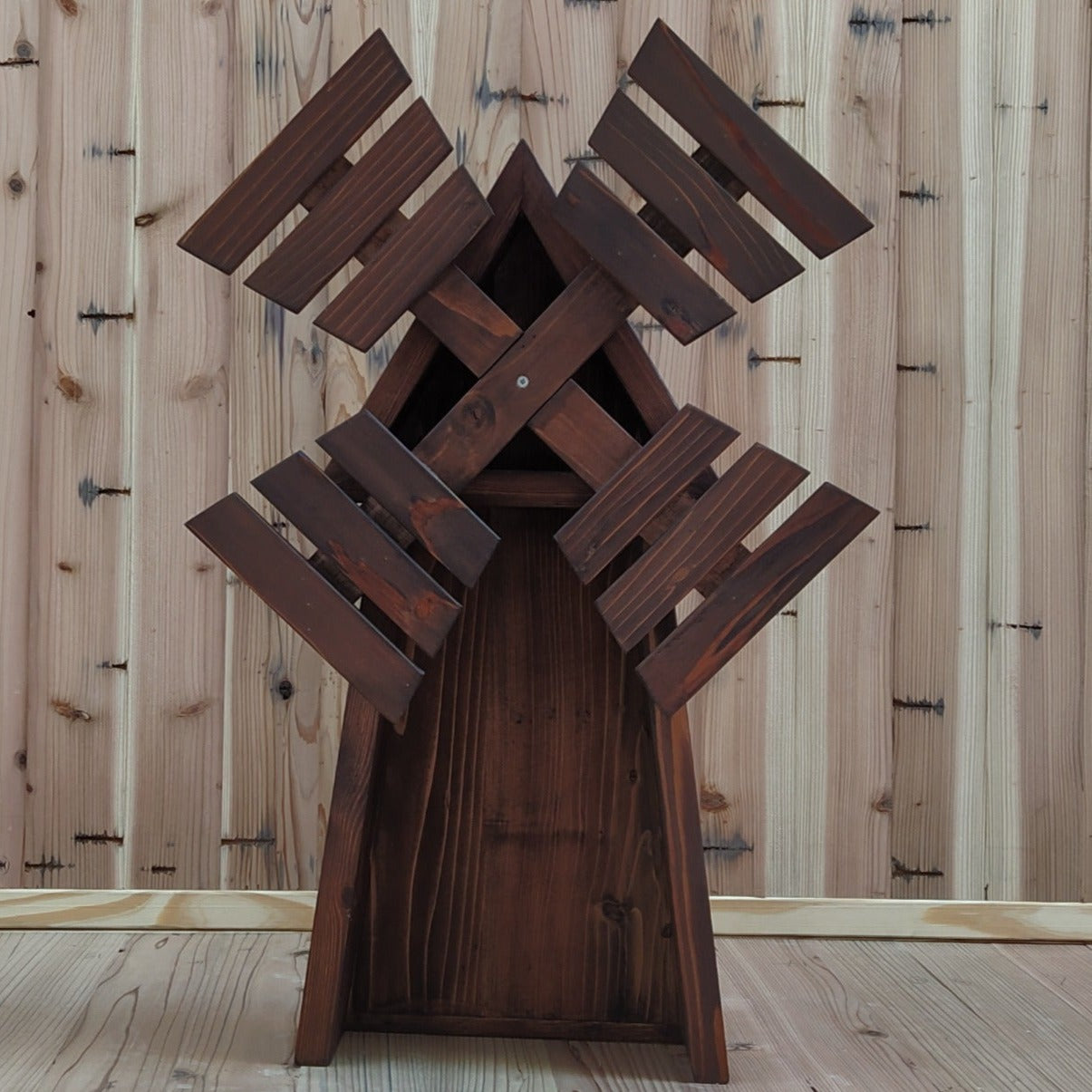 Rustic windmill baby photoshoot prop with vintage details, perfect for countryside and nature-themed photography.